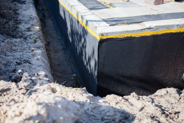 Professional Exterior Waterproofing technician working in Augusta, MI